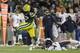 GREEN BAY, WI - NOVEMBER 04: Eddie Lacy #27 of the Green Bay Packers avoids the tackle from Chris Conte #47 of the Chicago Bears during the second half of play at Lambeau Field on November 04, 2013 in Green Bay, Wisconsin. (Photo by Mike McGinnis/Getty Im