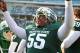 Nov 30, 2013; East Lansing, MI, USA; Michigan State Spartans defensive tackle Devyn Salmon (55) celebrates the win after a game against the Minnesota Golden Gophers at Spartan Stadium. Mandatory Credit: Mike Carter-USA TODAY Sports