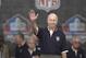CANTON, OH - AUGUST 3: Pro Football Hall of Famer (Class of 1977) Bart Starr waves to the crowd as he is introduced during the 2003 NFL Hall of Fame Induction ceremony on August 3, 2003 in Canton, Ohio. (Photo by David Maxwell/Getty Images)