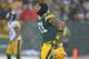 GREEN BAY, WI - DECEMBER 22: Andrew Quarless #81 of the Green Bay Packers walks off of the field after a loss to the Pittsburgh Steelers at Lambeau Field on December 22, 2013 in Green Bay, Wisconsin. The Steelers defeated the Packers 38-31. (Photo by Jon