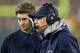 GREEN BAY, WI - NOVEMBER 04: Head coach Marc Trestman of the Chicago Bears calls a play against the Green Bay Packers as Jay Cutler #6 (L) listens in at Lambeau Field on November 4, 2013 in Green Bay, Wisconsin. The Bears defeated the Packers 27-20. (Phot