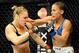Feb 23, 2013; Anaheim, CA, USA; Ronda Rousey and Liz Carmouche during their UFC women's world bantamweight championship bout at the Honda Center. Mandatory Credit: Jayne Kamin-Oncea-USA TODAY Sports