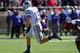 LUBBOCK, TX - NOVEMBER 9: Quarterback Jake Waters #15 of the Kansas State Wildcats breaks free for a touchdown during game action against the Texas Tech Red Raiders on November 9, 2013 at AT&T Jones Stadium in Lubbock, Texas. The Kansas State Wildcats w