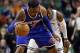 Jan 24, 2013; Boston, Massachusetts, USA; New York Knicks forward Carmelo Anthony (7) is guarded by Boston Celtics point guard Rajon Rondo (9) during the fourth quarter at TD Banknorth Garden. The New York Knicks won 89-86. Mandatory Credit: Greg M. Coo