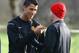 MANCHESTER, UNITED KINGDOM - NOVEMBER 24: Cristiano Ronaldo and Wayne Rooney of Manchester United share a joke during a Manchester United training session held at the Carrington Training Complex on November 24, 2008 in Manchester, England. (Photo by Ale