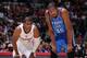 LOS ANGELES, CA - NOVEMBER 13: Chris Paul #3 of the Los Angeles Clippers and Kevin Durant #35 of the Oklahoma City Thunder look on during their game at Staples Center on November 13, 2013 in Los Angeles, California. NOTE TO USER: User expressly acknowledg