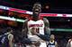 LOUISVILLE, KY - OCTOBER 29: Montrezl Harrell #24 of the Louisville Cardinals celebrates after dunking the ball against the Kentucky Wesleyan Panthers during the exhibition game at KFC YUM! Center on October 29, 2013 in Louisville, Kentucky. (Photo by