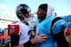 CHARLOTTE, NC - NOVEMBER 03: Cam Newton #1 of the Carolina Panthers talks to Matt Ryan #2 of the Atlanta Falcons after defeating the Falcons 34-10 at Bank of America Stadium on November 3, 2013 in Charlotte, North Carolina. (Photo by Streeter Lecka/Gett