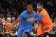 Dec 25, 2013; New York, NY, USA; Oklahoma City Thunder point guard Reggie Jackson (15) drives past New York Knicks shooting guard Toure' Murry (23) during the second quarter of a game at Madison Square Garden. Mandatory Credit: Brad Penner-USA TODAY Sport