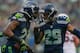 SEATTLE, WA - DECEMBER 22: Cornerback Richard Sherman #25 of the Seattle Seahawks celebrates with free safety Earl Thomas #29 after making an interception against the Arizona Cardinals at CenturyLink Field on December 22, 2013 in Seattle, Washington. (P