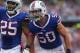 ORCHARD PARK, NY - OCTOBER 13: Kiko Alonso #50 of the Buffalo Bills and Da'Norris Searcy #25 celebrate after stopping the Cincinnati Bengals during NFL game action at Ralph Wilson Stadium on October 13, 2013 in Orchard Park, New York. (Photo by Tom Szcze
