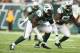 EAST RUTHERFORD, NJ - DECEMBER 01: Muhammad Wilkerson #96 of the New York Jets in action against the Miami Dolphins during their game at MetLife Stadium on December 1, 2013 in East Rutherford, New Jersey. (Photo by Al Bello/Getty Images)