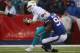 ORCHARD PARK, NY - DECEMBER 22: Ryan Tannehill #17 of the Miami Dolphins is sacked during NFL game action by Mario Williams #94 of the Buffalo Bills at Ralph Wilson Stadium on December 22, 2013 in Orchard Park, New York. (Photo by Tom Szczerbowski/Getty I