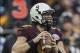 Dec 27, 2013; Houston, TX, USA; Minnesota Golden Gophers quarterback Philip Nelson (9) looks for an open receiver during the first quarter of the Texas Bowl against the Syracuse Orange at Reliant Stadium . Mandatory Credit: Troy Taormina-USA TODAY Sports