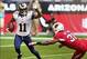 Dec 8, 2013; Phoenix, AZ, USA; St. Louis Rams wide receiver Tavon Austin (11) returns a kickoff past Arizona Cardinals cornerback Justin Bethel (31) in the first quarter at University of Phoenix Stadium. Mandatory Credit: Mark J. Rebilas-USA TODAY Sports