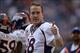 Dec 22, 2013; Houston, TX, USA; Denver Broncos quarterback Peyton Manning (18) gives a thumbs up to cheering fans against the Houston Texans during the second half at Reliant Stadium. The Broncos won 37-13. Mandatory Credit: Thomas Campbell-USA TODAY Spor