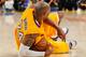 LOS ANGELES, CA - APRIL 12: Kobe Bryant #24 of the Los Angeles Lakers lies on the ground after getting injured during a game against the Golden State Warriors at Staples Center on April 12, 2013 in Los Angeles, California. NOTE TO USER: User expressly ack