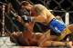 Jul 6, 2013; Las Vegas, NV, USA; Chris Weldman (blue shorts) and Anderson Silva during their Middleweight Chamionship Bout at the MGM Grand Garden Arena. Chris Weidman defeated Anderson in a TKO in the second round. Mandatory Credit: Jayne Kamin-Oncea-US