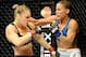 Feb 23, 2013; Anaheim, CA, USA; Ronda Rousey and Liz Carmouche during their UFC women's world bantamweight championship bout at the Honda Center. Mandatory Credit: Jayne Kamin-Oncea-USA TODAY Sports