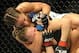 Feb 23, 2013; Anaheim, CA, USA; Ronda Rousey and Liz Carmouche during their UFC women's world bantamweight championship bout at the Honda Center. Mandatory Credit: Jayne Kamin-Oncea-USA TODAY Sports