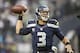 Dec 22, 2013; Seattle, WA, USA; Seattle Seahawks quarterback Russell Wilson (3) passes against the Arizona Cardinals during the fourth quarter at CenturyLink Field. Mandatory Credit: Joe Nicholson-USA TODAY Sports