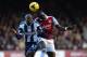 LONDON, ENGLAND - DECEMBER 28: Youssouf Mulumbu of West Brom battles in the air with Mohamed Diame of West Ham during the Barclays Premier League match between West Ham United and West Bromwich Albion at Boleyn Ground on December 28, 2013 in London, Engl