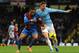 MANCHESTER, ENGLAND - DECEMBER 28: Jason Puncheon of Crystal Palace competes with Edin Dzeko of Manchester City during the Barclays Premier League match between Manchester City and Crystal Palace at the Etihad Stadium on December 28, 2013 in Manchester,