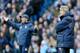 MANCHESTER, ENGLAND - DECEMBER 28: Manchester City Manager Manuel Pellegrini looks on as Crystal Palace Manager Tony Pulis reacts during the Barclays Premier League match between Manchester City and Crystal Palace at the Etihad Stadium on December 28, 20