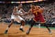 BOSTON, MA - DECEMBER 28: Kyrie Irving #2 of the Cleveland Cavaliers drives the ball against Jordan Crawford #27 of the Boston Celtics on December 28, 2013 at the TD Garden in Boston, Massachusetts. NOTE TO USER: User expressly acknowledges and agrees th