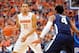Dec 28, 2013; Syracuse, NY, USA; Syracuse Orange guard Tyler Ennis (11) scans the court around Villanova Wildcats guard Darrun Hilliard (4) during the first half at the Carrier Dome. Mandatory Credit: Rich Barnes-USA TODAY Sports