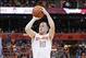 Dec 20, 2013; Syracuse, NY, USA; Syracuse Orange guard Trevor Cooney (10) takes a jump shot during the second half of a game against the High Point Panthers at the Carrier Dome. Syracuse won the game 75-54. Mandatory Credit: Mark Konezny-USA TODAY Sports
