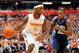 Dec 28, 2013; Syracuse, NY, USA; Syracuse Orange forward C.J. Fair (5) drives to the basket past Villanova Wildcats guard James Bell (32) during the first half at the Carrier Dome. Mandatory Credit: Rich Barnes-USA TODAY Sports