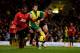 NORWICH, ENGLAND - DECEMBER 28: Patrice Evra and Nemanja Vidic Manchester United battle with Wes Hoolahan of Norwich City during the Barclays Premier League match between Norwich City and Manchester United at Carrow Road on December 28, 2013 in Norwich,