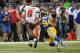 ST. LOUIS, MO - DECEMBER 22: Mike Glennon #8 of the Tampa Bay Buccaneers is sacked in the fourth quarter by Robert Quinn #94 of the St. Louis Rams at the Edward Jones Dome on December 22, 2013 in St. Louis, Missouri. (Photo by Michael Thomas/Getty Images