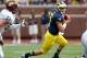 ANN ARBOR, MI - AUGUST 31: Shane Morris #7 of the Michigan Wolverines rolls out during a game with the Central Michigan Chippewas at Michigan Stadium on August 31, 2013 in Ann Arbor, Michigan. (Photo by Gregory Shamus/Getty Images)