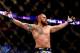 BOSTON, MA - AUGUST 17: Travis Browne celebrates after winning with a knockout against Alistair Overeem in their heavyweight bout at TD Garden on August 17, 2013 in Boston, Massachusetts. (Photo by Jared Wickerham/Getty Images)