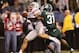 Dec 7, 2013; Indianapolis, IN, USA; Michigan State Spartans cornerback Darqueze Dennard (31) breaks up a pass intended for Ohio State Buckeyes wide receiver Devin Smith (9) during the Big Ten Championship game at Lucas Oil Stadium. Mandatory Credit: Brian