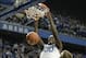 Dec 28, 2013; Lexington, KY, USA; Kentucky Wildcats forward Julius Randle (30) dunks against Louisville Cardinals forward Stephan Van Treese (44) during the first half at Rupp Arena. Mandatory Credit: Jamie Rhodes-USA TODAY Sports