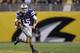 TEMPE, AZ - DECEMBER 28: Quarterback Jake Waters #15 of the Kansas State Wildcats scrambles with the football during the first quarter of the Buffalo Wild Wings Bowl against the Michigan Wolverines at Sun Devil Stadium on December 28, 2013 in Tempe, Ariz