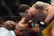 Dec 28, 2013; Las Vegas, NV, USA; Chris Weidman (red gloves) and Anderson Silva (blue gloves) fight during their UFC middleweight championship bout at the MGM Grand Garden Arena. Weidman won. Mandatory Credit: Jayne Kamin-Oncea-USA TODAY Sports