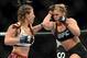 Dec 28, 2013; Las Vegas, NV, USA; Ronda Rousey (red gloves) and Miesha Tate (blue gloves) fight during their UFC women's bantamweight championship bout at the MGM Grand Garden Arena. Mandatory Credit: Jayne Kamin-Oncea-USA TODAY Sports