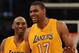 LOS ANGELES, CA - FEBRUARY 20: Andrew Bynum #17 and Kobe Bryant #24 of the Los Angeles Lakers smile as they head back to the bench leading the Portland Trail Blazers during the fourth quarter at Staples Center on February 20, 2012 in Los Angeles, Califor
