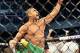 May 18, 2013; Jaragua do Sul, BRAZIL; Vitor Belfort (red shorts) celebrates after defeating Luke Rockhold (not pictured) during UFC on FX 8 at ARena Jaragua. Mandatory Credit: Jason da Silva-USA TODAY Sports