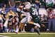 INDIANAPOLIS, IN - DECEMBER 07: Darqueze Dennard #31 of the Michigan State Spartans breaks up a pass to Devin Smith #9 of the Ohio State Buckeyes during the Big Ten Conference Championship game at Lucas Oil Stadium on December 7, 2013 in Indianapolis, In