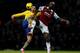 LONDON, ENGLAND - DECEMBER 26: Carlton Cole of West Ham United battles with Mikel Arteta of Arsenal during the Barclays Premier League match between West Ham United and Arsenal at Boleyn Ground on December 26, 2013 in London, England. (Photo by Ian Walt