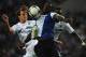PORTO, PORTUGAL - AUGUST 25: Jackson Martinez (C) of FC Porto is challenged during the Liga Zon Sagres match between FC Porto and Vitoria Guimaraes at Estadio do Dragao on August 25, 2012 in Porto, Portugal. (Photo by Valerio Pennicino/Getty Images)