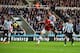 NEWCASTLE UPON TYNE, ENGLAND - DECEMBER 29: Olivier Giroud of Arsenal scores the opening goal during the Barclays Premier League match between Newcastle United and Arsenal at St James' Park on December 29, 2013 in Newcastle upon Tyne, England. (Photo by