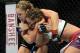 Dec 28, 2013; Las Vegas, NV, USA; Ronda Rousey (red gloves) and Miesha Tate (blue gloves) fight during their UFC women's bantamweight championship bout at the MGM Grand Garden Arena. Mandatory Credit: Jayne Kamin-Oncea-USA TODAY Sports