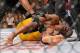Dec 28, 2013; Las Vegas, NV, USA; Anderson Silva reacts after breaking his leg on a kick to Chris Weidman (not pictured) during their UFC middleweight championship bout at the MGM Grand Garden Arena. Mandatory Credit: Jayne Kamin-Oncea-USA TODAY Sports
