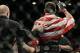 Dec 28, 2013; Las Vegas, NV, USA; Chris Weidman reacts in the cage after defeating Anderson Silva (not pictured) in their UFC middleweight championship bout at the MGM Grand Garden Arena. Mandatory Credit: Jayne Kamin-Oncea-USA TODAY Sports
